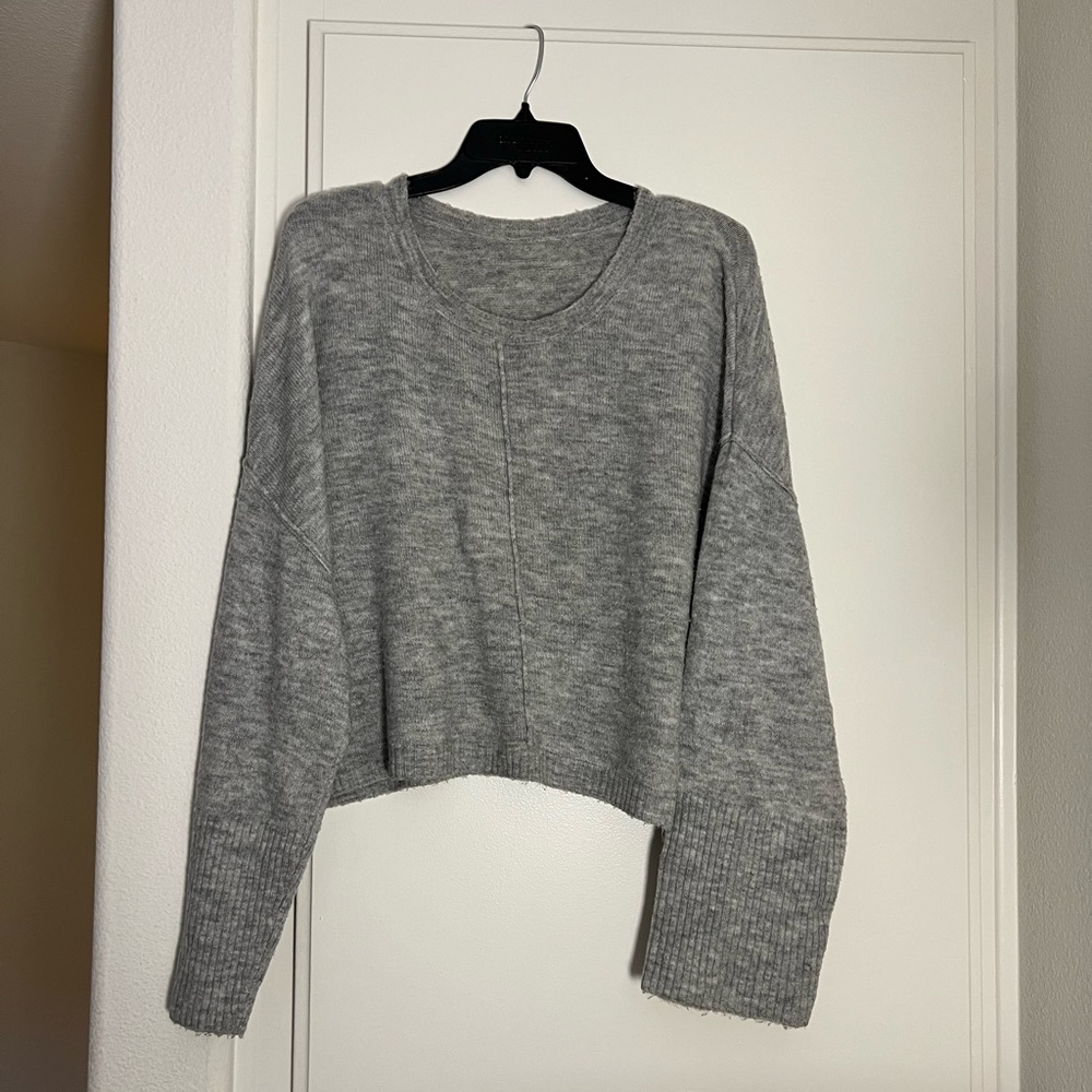 Loose grey sweater